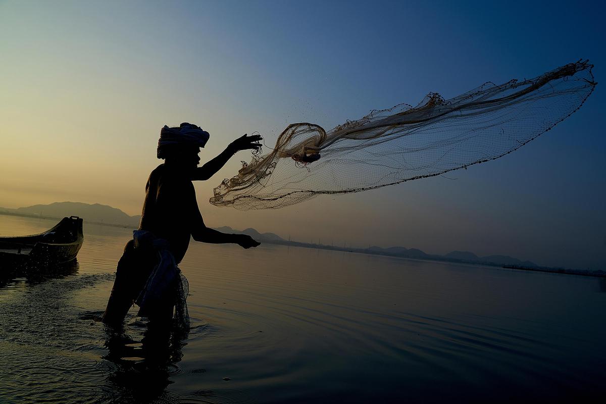 Image of Sky, Water, Fishing, Fishing net, Fisherman, Recreational fishing etc.