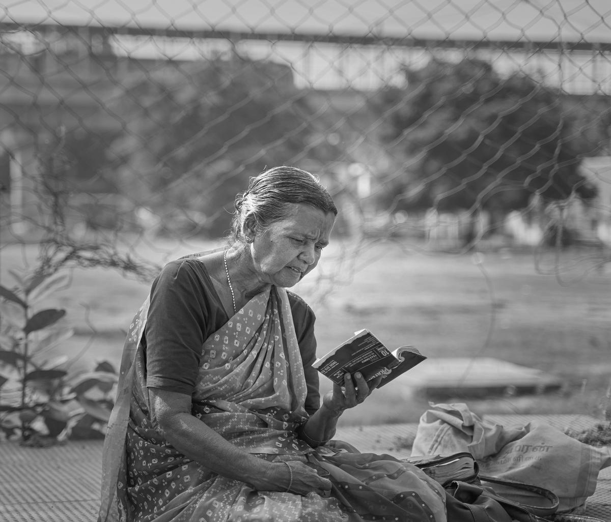 Image of Black-and-white, Sitting, Reading etc.