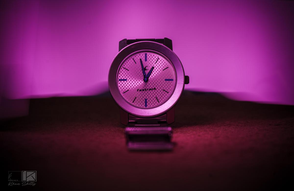 Image of Purple, Pink, Automotive lighting, Liquid, Clock, Rectangle etc.