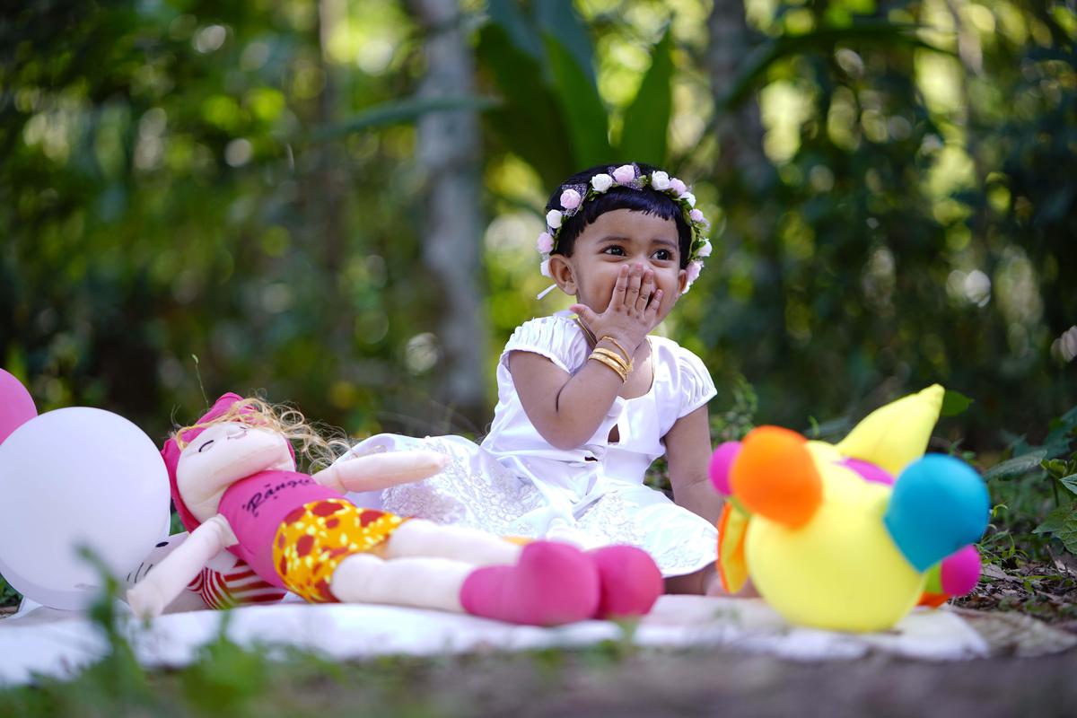 Image of Pink, Grass, Water, Happy, Dress, Toy etc.