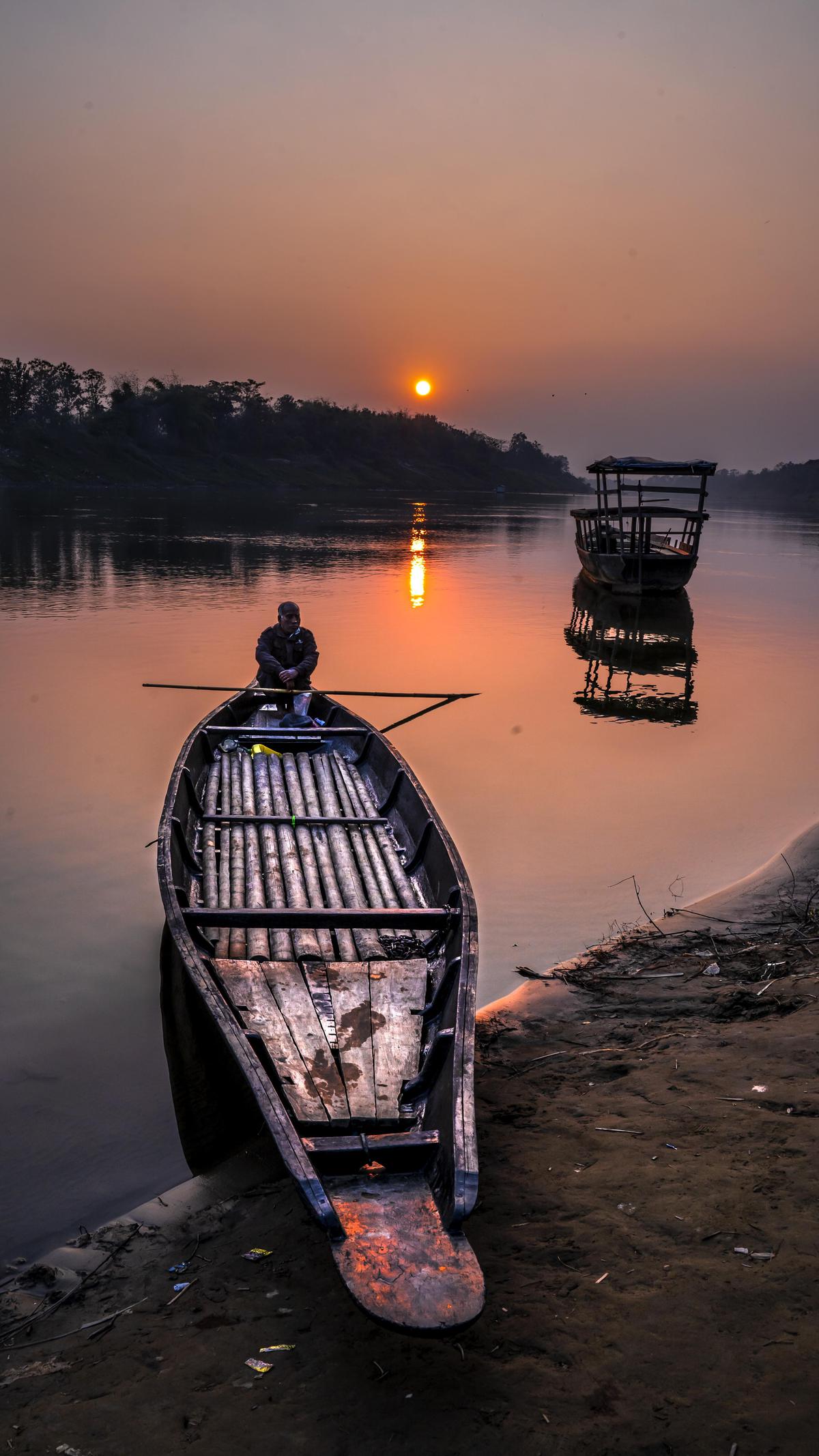 Image of Sky, Morning, Sunset, Vehicle, Mode of transport, Water etc.