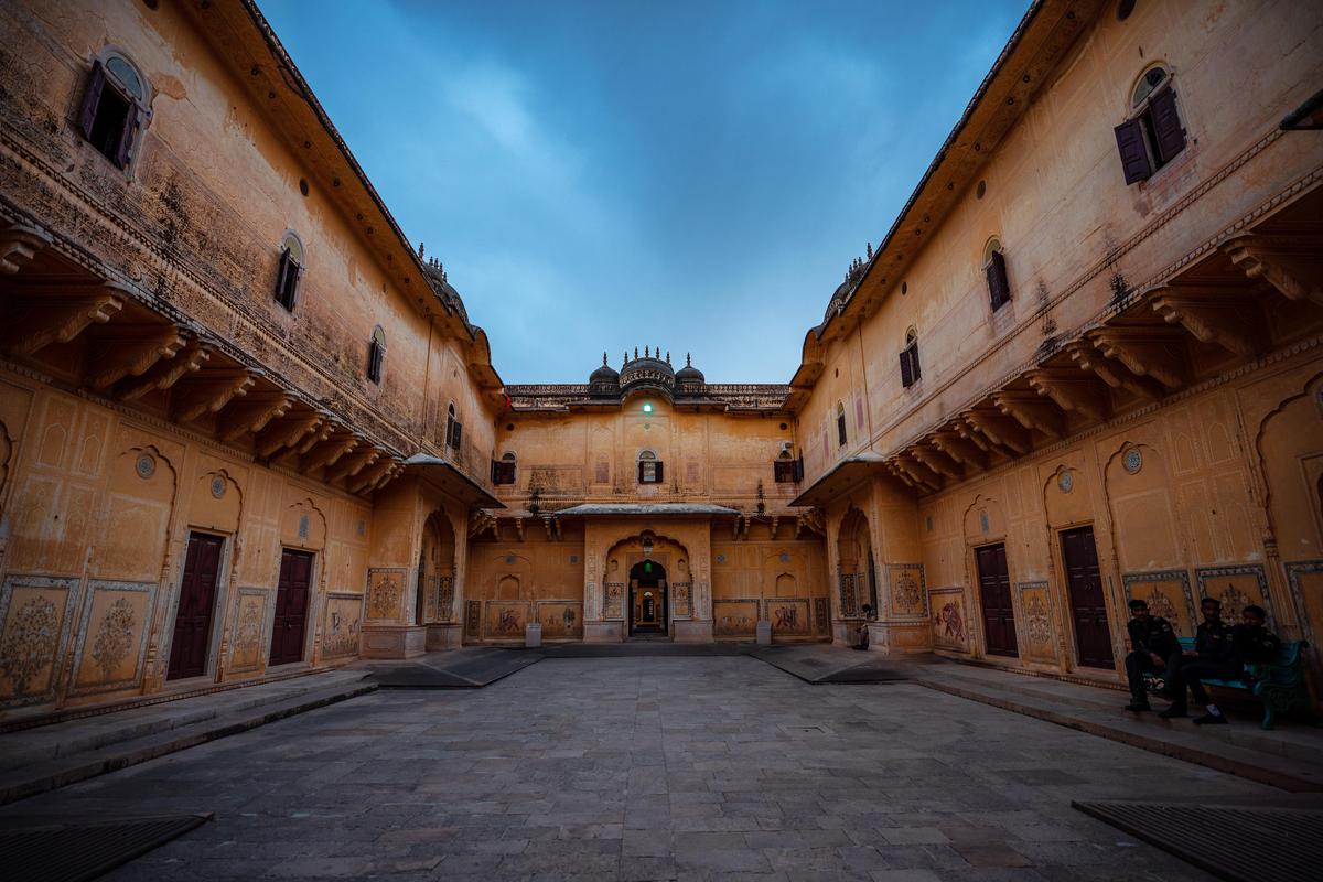 Image of Sky, Cloud, Building, Window, Door, Wheel etc.