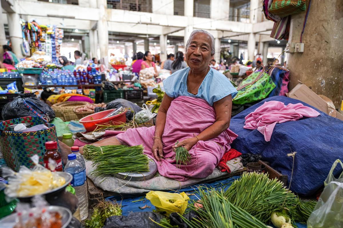Image of People, City, Human settlement, Selling, Public space, Marketplace etc.