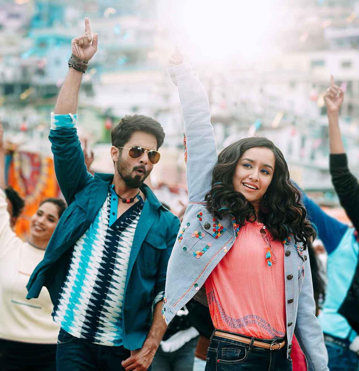 Image of Street fashion, Arm, Jeans, Sunglasses, Denim, Cheering etc.