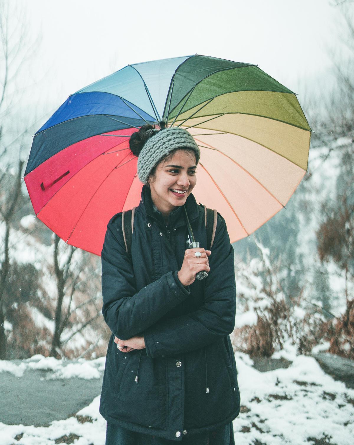 Image of Smile, Black, Outerwear, Human, People in nature, Snow etc.